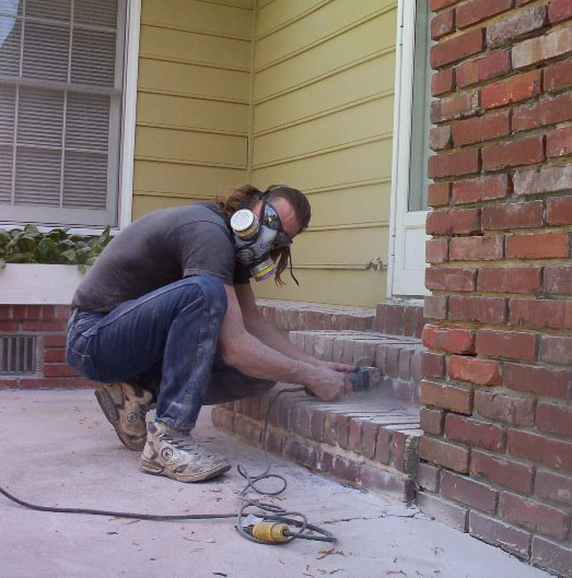 working on brick staircase